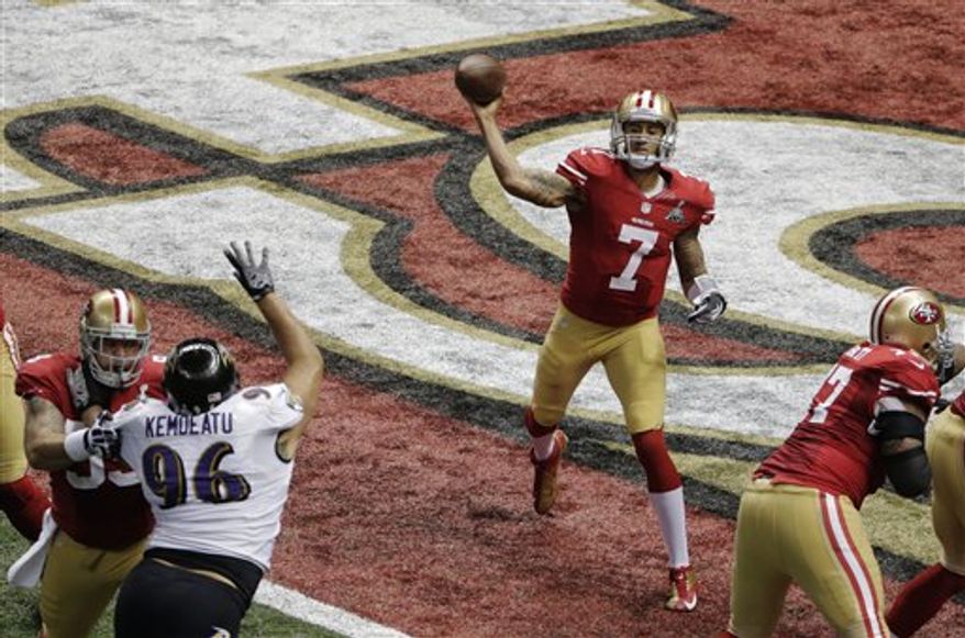 San Francisco 49ers quarterback Colin Kaepernick (7) passes the ball against the Baltimore Ravens during the first half of the NFL Super Bowl XLVII football game Sunday, Feb. 3, 2013, in New Orleans. (AP Photo/Charlie Riedel)