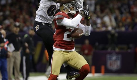 San Francisco 49ers defensive back Chris Culliver (29) breaks up a pass intended for Baltimore Ravens wide receiver Torrey Smith (82) during the first half of the NFL Super Bowl XLVII football game Sunday, Feb. 3, 2013, in New Orleans. (AP Photo/Matt Slocum) 