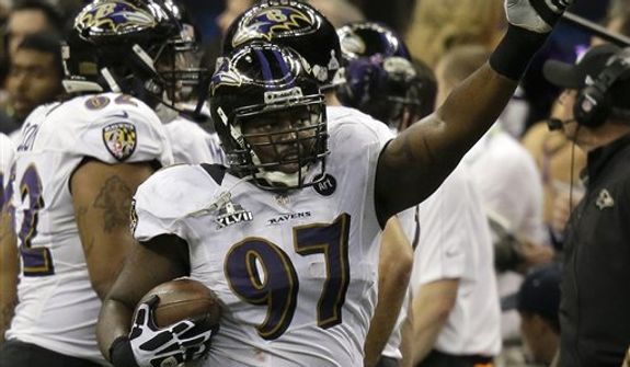 Baltimore Ravens defensive end Arthur Jones (97) celebrates after recovering a fumble by San Francisco 49ers running back LaMichael James during the first half of NFL Super Bowl XLVII football game Sunday, Feb. 3, 2013, in New Orleans. (AP Photo/Gene Puskar) 
