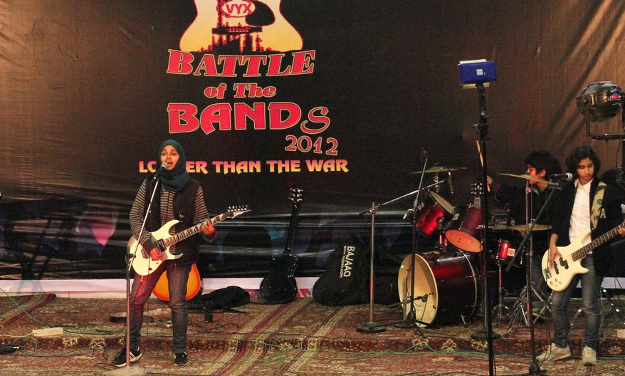 Members of Pragaash perform at a "Battle of the Bands" in Srinagar, India, where they finished third. The band disbanded after only one concert because of an edict from a top Muslim cleric. They were also called "sluts" and "prostitutes" who should be expelled from the region. (Associated Press)