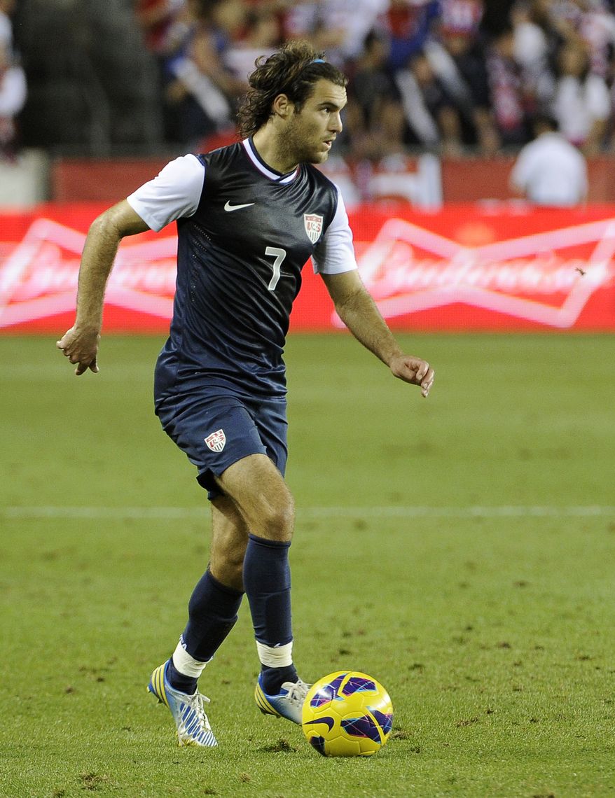 **FILE** U.S. national team's Graham Zusi, a former University of Maryland player, moves the ball in the first half of an exhibition game against Canada Tuesday, Jan. 29, 2013, in Houston. (AP Photo/Pat Sullivan)