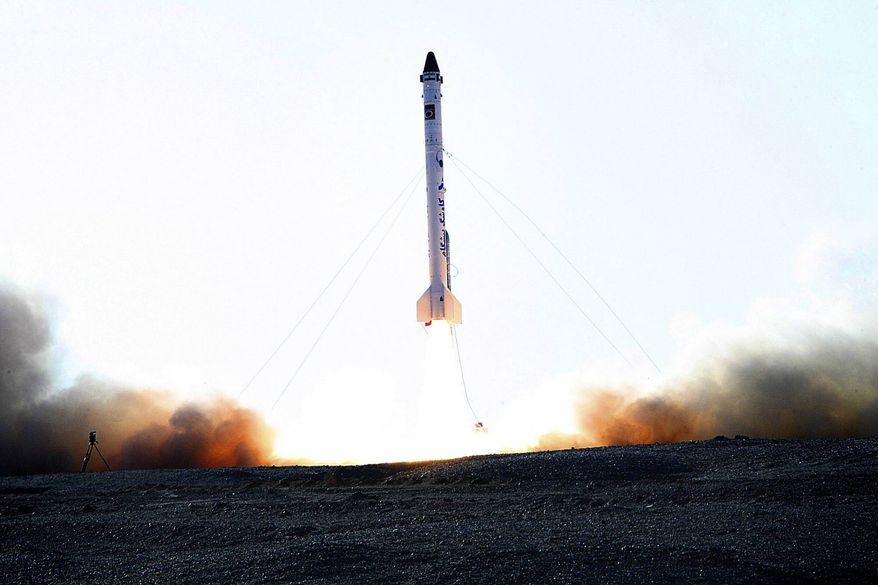 ** FILE ** In this picture obtained from the Iranian Students News Agency, ISNA, the rocket dubbed "Pishgam," or "Pioneer," is launched, in an undisclosed location in Iran. A gray-tufted monkey strapped in a pod resembling an infant's car seat rode an Iranian rocket into space and returned safely, officials said Monday, Jan. 28, 2013, in what was described as a step toward Tehran's goal of a manned space flight. (AP Photo/ISNA, Mohammad Agah)