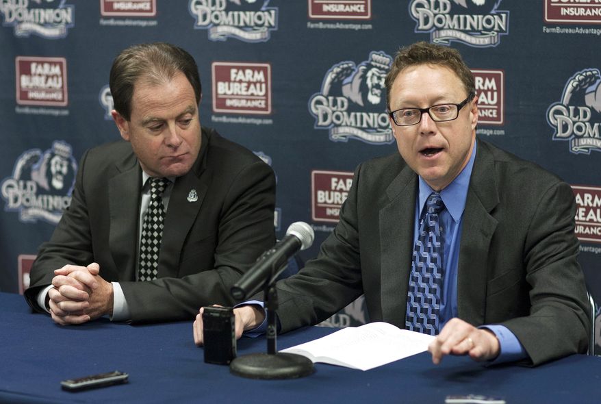 Old Dominion Director of Athletics Wood Selig, right, speaks as Old Dominion President John Broderick watches during an NCAA college basketball news conference announcing the firing of head basketball coach Blaine Taylor on Tuesday, Feb. 5, 2013, in Norfolk, Va. Associate head coach Jim Corrigan will serve as the interim coach through the remainder of the season. (AP Photo/The Virginian-Pilot, L. Todd Spencer)