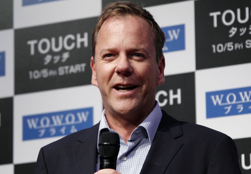 Actor Kiefer Sutherland speaks about his TV drama "Touch" during a press conference in Tokyo on Monday, Sept. 3, 2012. (AP Photo/Koji Sasahara)