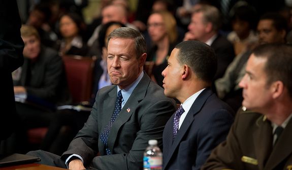 Maryland Gov. Martin O&#39;Malley, left, speaks with Maryland Lt. Gov. Anthony Brown, second from right, after testifying at a Judicial Proceedings Committee hearing to urge state lawmakers to pass legislation requiring residents to obtain a license before purchasing a handgun, ban assault weapons, limit magazine capacities to 10 rounds and require prospective gun buyers to complete a safety course and pay a $100 application fee, Annapolis, Md., Wednesday, February 6, 2013. (Andrew Harnik/The Washington Times)