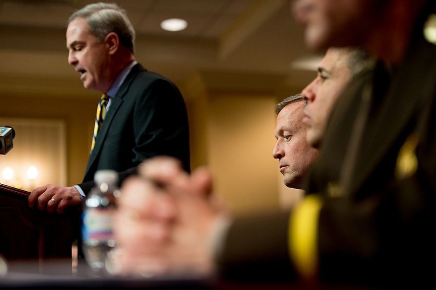 Maryland Gov. Martin O'Malley, third from right, sits after testifying at a Judicial Proceedings Committee hearing to urge state lawmakers to pass legislation requiring residents to obtain a license before purchasing a handgun, ban assault weapons, limit magazine capacities to 10 rounds and require prospective gun buyers to complete a safety course and pay a $100 application fee, Annapolis, Md., Wednesday, February 6, 2013. (Andrew Harnik/The Washington Times)