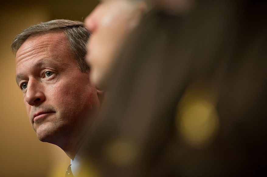 Maryland Gov. Martin O'Malley sits after testifying at a Judicial Proceedings Committee hearing to urge state lawmakers to pass legislation requiring residents to obtain a license before purchasing a handgun, ban assault weapons, limit magazine capacities to 10 rounds and require prospective gun buyers to complete a safety course and pay a $100 application fee, Annapolis, Md., Wednesday, February 6, 2013. (Andrew Harnik/The Washington Times)