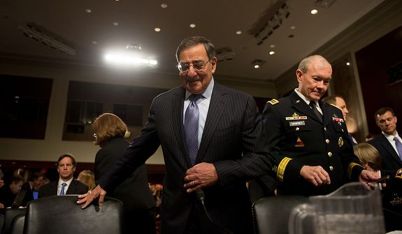 Secretary of Defense Leon E. Panetta (center) and Army Gen. Martin E. Dempsey (right), chairman of the Joint Chiefs of Staff, arrive to testify before the Senate Armed Services Committee on Capitol Hill in Washington on Thursday, Feb. 7, 2013, on the Defense Department&#39;s response to the attack on U.S. facilities in Benghazi, Libya. (Andrew Harnik/The Washington Times)
