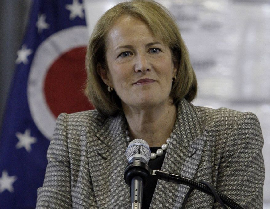 ** FILE ** In this Tuesday, May 10, 2011, file photo, Karen Mills, of the Small Business Administration, participates in a discussion, in Dayton, Ohio. Mills is stepping down. (AP Photo/Al Behrman, File)