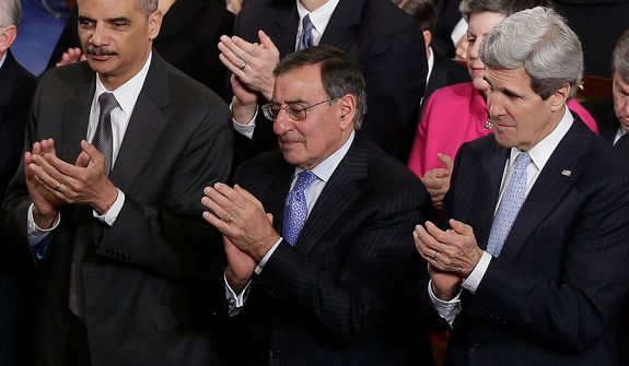From left, Attorney General Eric Holder, outgoing Defense Secretary Leon Panetta and Secretary of State John Kerry applaud  during President Barack Obama&#39;s State of the Union address during a joint session of Congress on Capitol Hill in Washington, Tuesday Feb. 12, 2013. (AP Photo/J. Scott Applewhite)