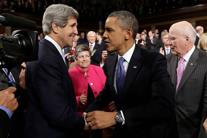 Secretary of State John Kerry greets President Barack Obama before the president's State of the Union address during a joint session of Congress on Capitol Hill in Washington, Tuesday Feb. 12, 2013. Sen.Patrick Leahy, D-Vt. is at right, Homeland Security Secretary Janet Napolitano is at center. (AP Photo/Charles Dharapak, Pool)