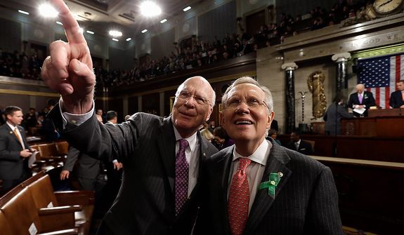 Sen. Patrick Leahy, D-Vt., left, and Senate Majority Leader Harry Reid of Nev. arrive on Capitol Hill in Washington, Tuesday, Feb. 12, 2013 for President Barack Obama&#39;s State of the Union address during a joint session of Congress on Capitol Hill in Washington. (AP Photo/Charles Dharapak, Pool)