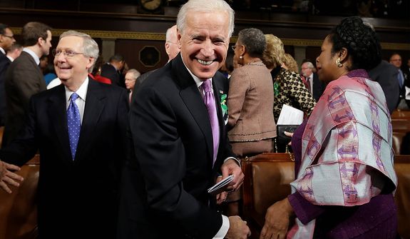 Vice President Joe Biden, Senate Minority Leader Mitch McConnell of Ky., left, Rep. Shelia Jackson Lee, D-Texas, right, and others arrive on Capitol Hill in Washington, Tuesday, Feb. 12, 2103, for President Barack Obama&#39;s State of the Union address during a joint session of Congress. (AP Photo/Charles Dharapak, Pool)