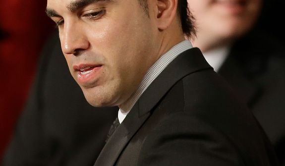 Bobak Ferdowsi, flight director, Mars Curiosity Rover, arrives as a guest of first lady Michelle Obama for President Barack Obama&#39;s State of the Union address, Tuesday, Feb. 12, 2103, on Capitol Hill in Washington. (AP Photo/Pablo Martinez Monsivais)