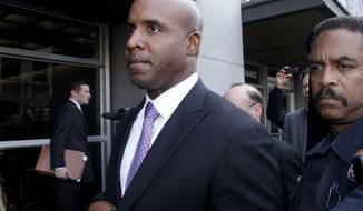 **FILE** In this Wednesday, April 13, 2011 file photo, former baseball player Barry Bonds leaves federal court in San Francisco, after being found guilty of one count of obstruction of justice. Bonds&#39; appeal of his obstruction of justice conviction is scheduled to be heard by a three judge panel of the 9th U.S. Circuit Court of Appeals, Wednesday, Feb. 13, 2013. (AP Photo/George Nikitin, File)