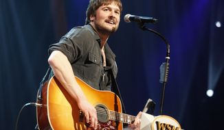 Country singer Eric Church performs at the Grand Ole Opry in Nashville, Tenn., on March 18, 2011. Mr. Church is the top nominee, with seven nominations, for the Academy of Country Music Awards in 2013. (AP Photo/Ed Rode)