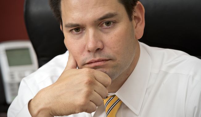 **FILE** Sen. Marco Rubio, Florida Republican, speaks Feb. 7, 2013, with The Associated Press in his Capitol Hill office in Washington. (Associated Press)