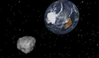 This image shows a simulation of asteroid 2012 DA14 approaching from the south as it passes through the Earth-moon system on Feb. 15, 2013. The 150-foot object passed within 17,000 miles of the Earth. (Associated Press/NASA/JPL-Caltech)