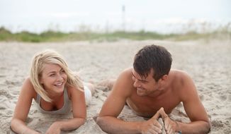 Julianne Hough&#x27;s character leaves Boston with police in pursuit and ends up in a South Carolina beach town where she bonds with Josh Duhamel&#x27;s character in &quot;Safe Haven.&quot; (Relativity Media via Associated Press)