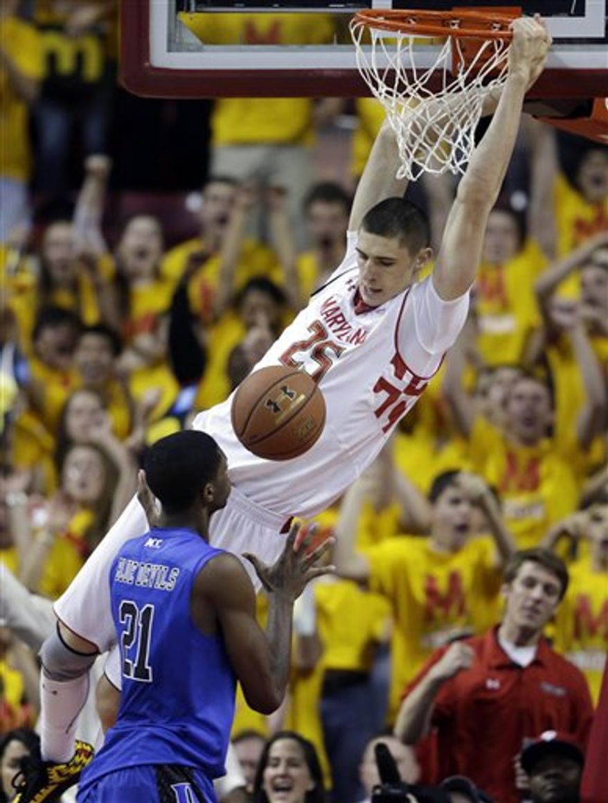 Maryland center Alex Len, top, of Ukraine, dunks on Duke forward Amile Jefferson in the first half of an NCAA college basketball game in College Park, Md., Saturday, Feb. 16, 2013. (AP Photo/Patrick Semansky)