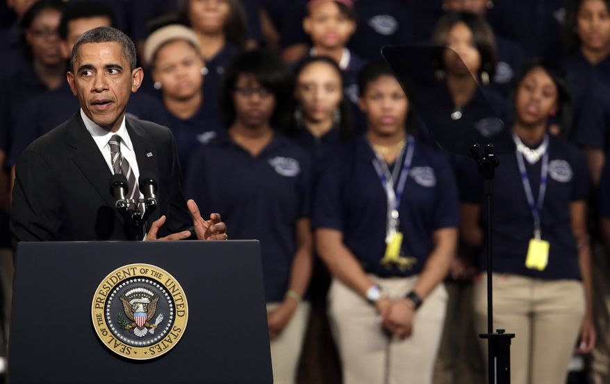 President Obama speaks about strengthening the economy for the middle class and the nation's struggle with gun violence at an appearance at Hyde Park Academy on Friday, Feb. 15, 2013, in Chicago. (AP Photo/M. Spencer Green)