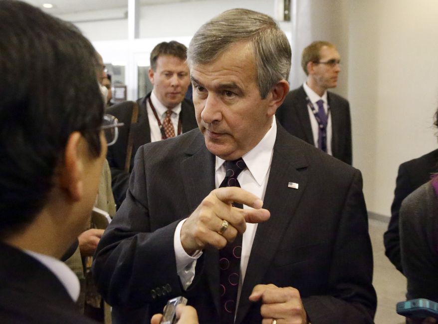 **FILE** Sen. Mike Johanns, Nebraska Republican, speaks with reporters on Capitol Hill in Washington on Nov. 13, 2012. (Associated Press)
