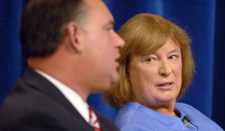 **FILE** Incumbent Rep. Frank Guinta, New Hampshire Republican, and Democratic challenger Carol Shea-Porter debate during the 1st Congressional District forum on Sept. 17, 2012, at St. Anselm College in Manchester, N.H. (Associated Press/The Union Leader)