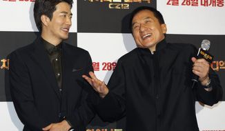 Hong Kong actor-director Jackie Chan (right) and South Korean actor Kwon Sang-woo promote their latest movie, &quot;CZ12,&quot; or &quot;Chinese Zodiac,&quot; in Seoul on Monday, Feb. 18, 2013. (AP Photo/Ahn Young-joon)