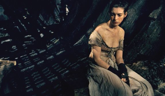 This image released by Universal Pictures shows Anne Hathaway as Fantine in a scene from &quot;Les MisÈrables.&quot; The costumes for the film were designed by Spanish designer Paco Delgado. Delgado is nominated for an Academy Award for his costumes from the film. The 85th Academy Awards will be held on Sunday, Feb. 24. (AP Photo/Universal Pictures)