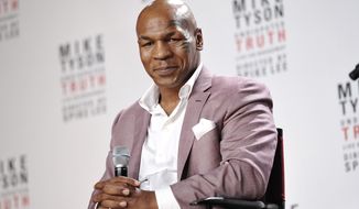 Former heavyweight boxing champion Mike Tyson announces &quot;Mike Tyson: Undisputed Truth,&quot; a one-man Broadway show, in New York on Tuesday, June 18, 2012. (Evan Agostini/Invision/AP)