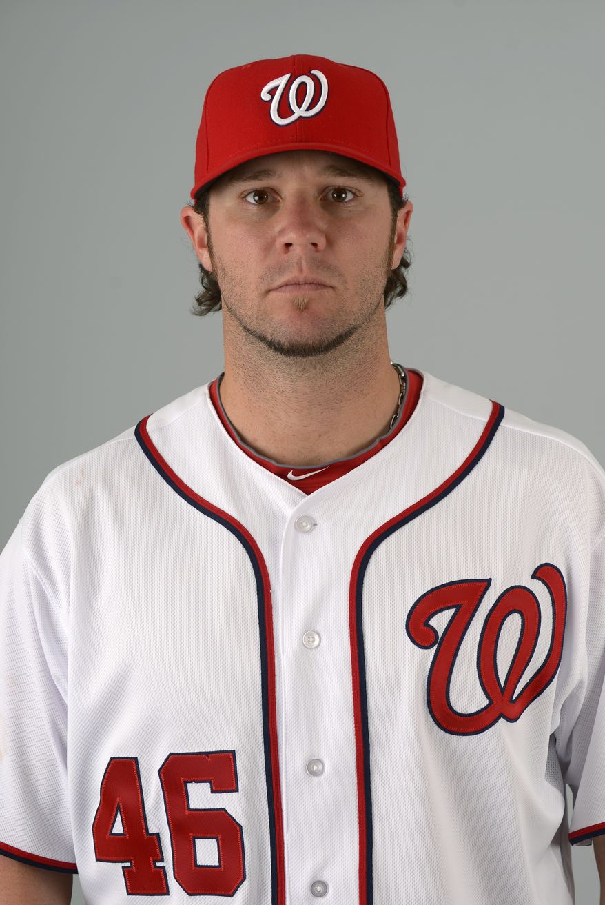 This is a 2013 photo of Micah Owings of the Washington Nationals baseball team. This image reflects the Nationals active roster as of Feb. 20, 2013 when this image was taken.(AP Photo/Phelan M. Ebenhack)