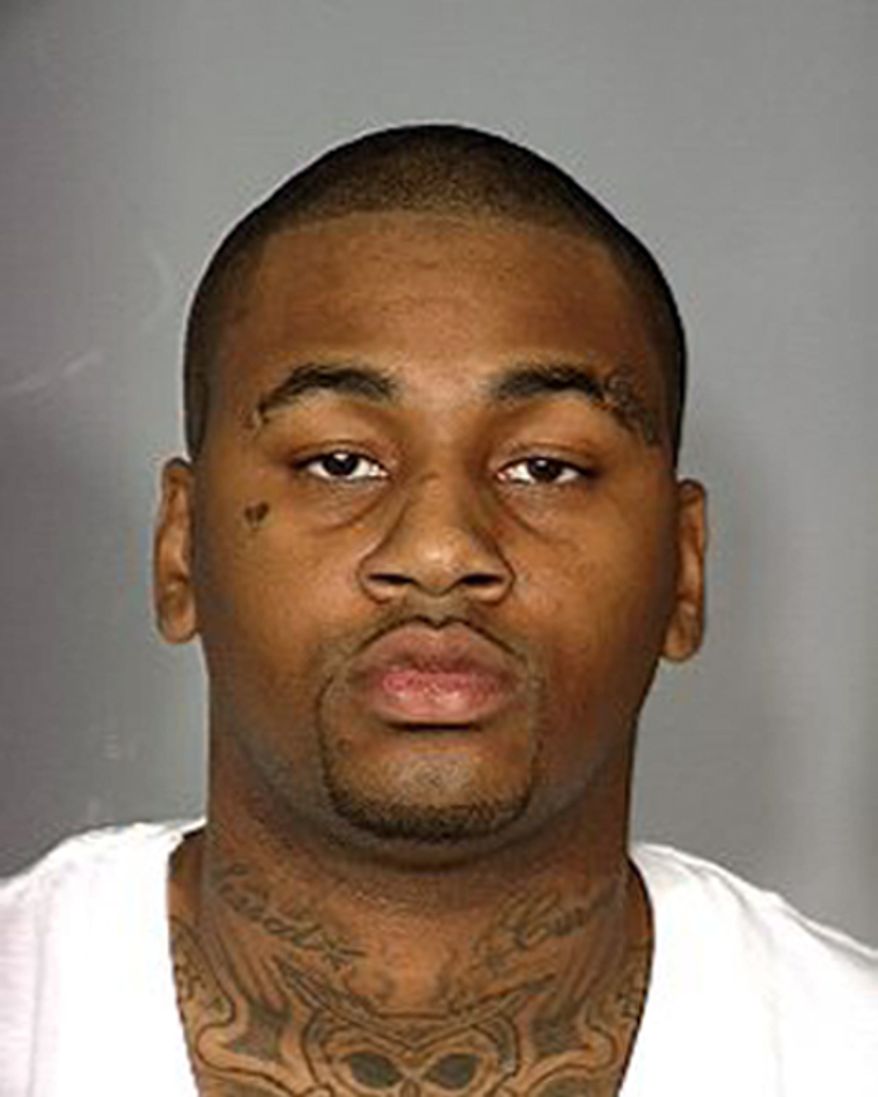 Ammar Harris is shown in a booking photo from a 2012 arrest in Las Vegas. Police have identified Mr. Harris as a suspect in a shooting that sent a Maserati into a taxi that exploded, killing three people on Feb. 21, 2013, in Las Vegas. (AP Photo/Las Vegas Metropolitan Police Department)