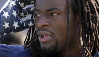 Senior Bowl North Squad defensive back Johnathan Cyprien of Florida International (37) talks with reporters during Senior Bowl football practice at Ladd-Peebles Stadium in Mobile, Ala., Tuesday, Jan. 22, 2013.(AP Photo/Dave Martin)