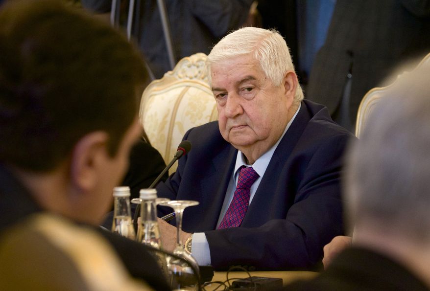 Syrian Foreign Minister Walid al-Moallem attends a meeting with his Russian counterpart Sergey Lavrov, unseen, in Moscow on Monday, Feb. 25, 2013. (AP Photo/Ivan Sekretarev)