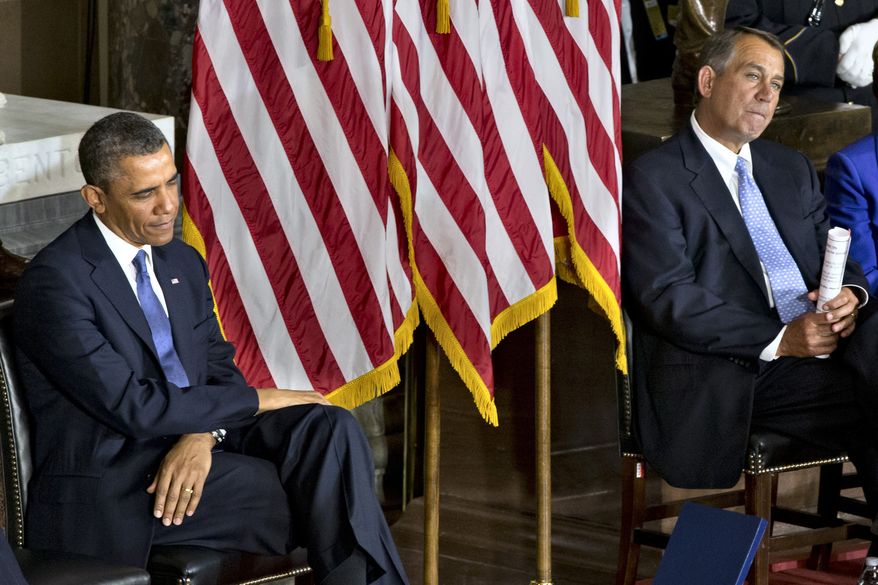 **FILE** President Obama and House Speaker John Boehner, Ohio Republican, sit during a ceremony to dedicate a statue of civil rights icon Rosa Parks on Feb. 27, 2013, in the Capitol&#39;s Statuary Hall. (Associated Press)