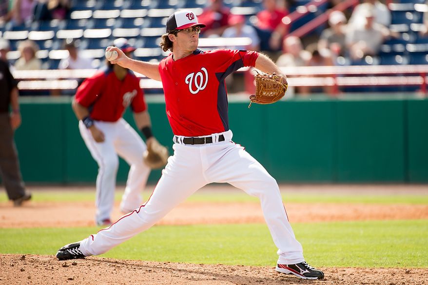 Washington Nationals relief pitcher Erik Davis (55) pitches as the Washington Nationals play the Florida Marlins during spring training at Space Coast Stadium, Viera, Fla., Wednesday, February 27, 2013. (Andrew Harnik/The Washington Times)
