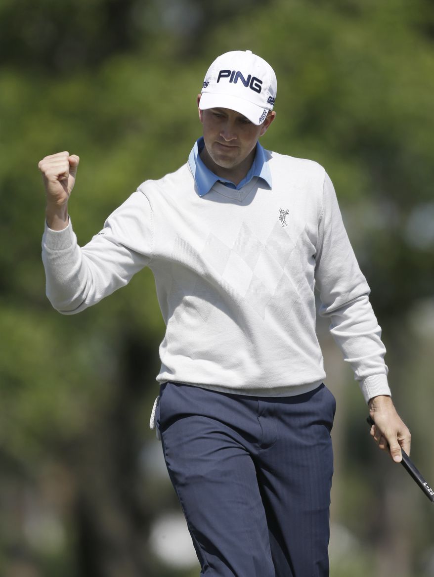 Michael Thompson celebrates after making a putt on the third hole for an eagle during the final round of the Honda Classic golf tournament on Sunday, March 3, 2013, in Palm Beach Gardens, Fla. (AP Photo/Wilfredo Lee)