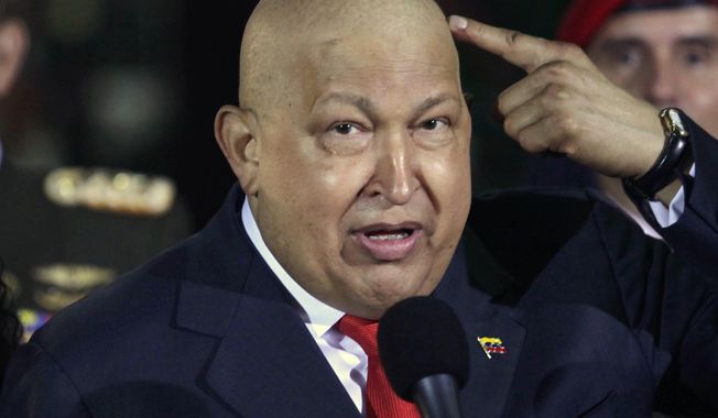 ** FILE **Venezuela&#x27;s deceased president Hugo Chavez (AP Photo/Ariana Cubillos, file)

