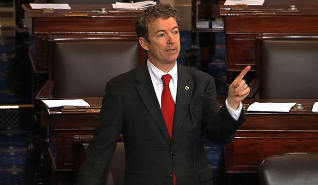 This video frame grab provided by Senate Television shows Sen. Rand Paul, Kentucky Republican, speaking on the floor of the Senate on Capitol Hill in Washington on Wednesday, March 6, 2013. Senate Democrats pushed Wednesday for speedy confirmation of John O. Brennan&#x27;s nomination to be CIA director but ran into a snag after Mr. Paul began a lengthy filibuster over the legality of potential drone strikes on U.S. soil. (Associated Press/Senate Television)