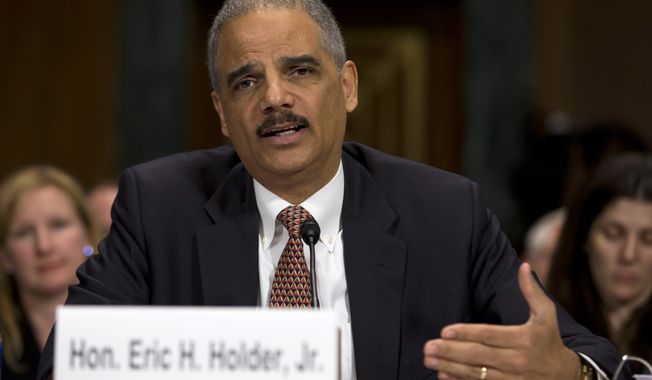 Attorney General Eric Holder testifies on Capitol Hill in Washington on March 6, 2013, before the Senate Judiciary Committee hearing &quot;Oversight of the U.S. Department of Justice.&quot; (Associated Press)