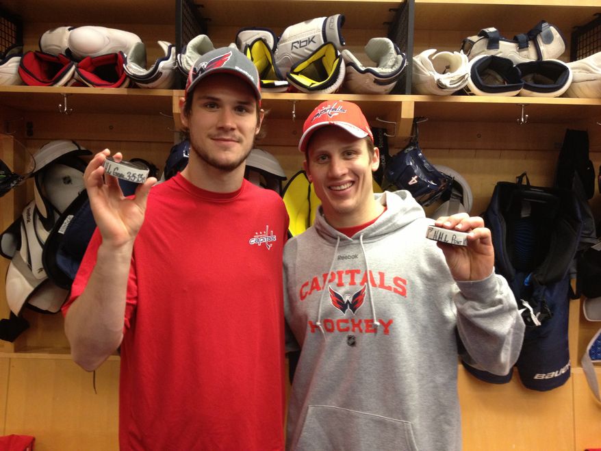 Tomas Kundratek (left, first NHL goal) and Steve Oleksy (first NHL point) celebrated milestones Tuesday night in the Capitals' victory over the Bruins. (Photo courtesy Ben Guerrero / Washington Capitals)