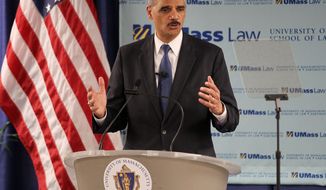 **FILE** U.S. Attorney General Eric Holder delivers an address at the University of Massachusetts School of Law in Dartmouth, Mass., on March 1, 2013. (Associated Press)