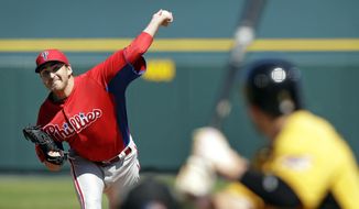 Philadelphia Phillies starting pitcher John Lannan throws during a baseball spring training exhibition game against the Pittsburgh Pirates, Monday, March 4, 2013, in Bradenton, Fla. (AP Photo/Charlie Neibergall)