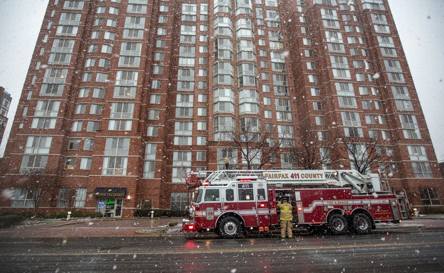 Fairfax County firefighters respond to a call in Alexandria, Va., Wednesday, March 6, 2013. (Andrew S. Geraci/The Washington Times)