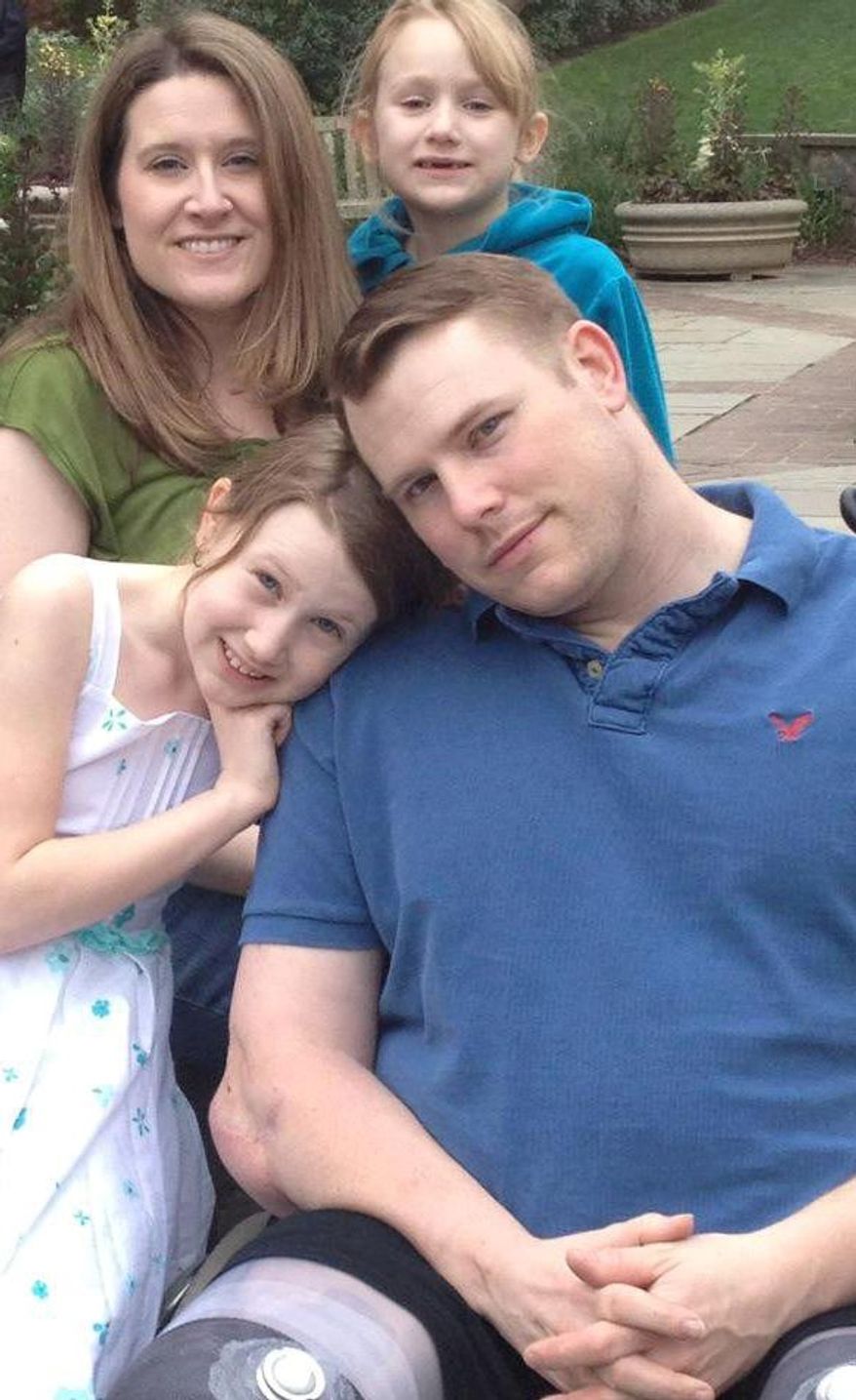 welcome home: “We’re the reality check,” said 34-year-old Jessica Allen, shown here with her daughters Deryn, 7, and Ryann, 10, and husband, 33-year-old double amputee retired Army Staff Sgt. Chaz Allen. The family lives in Clarksville, Tenn. (Jessica Allen)