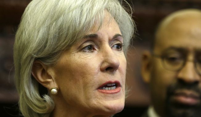 **FILE** Health and Human Services Secretary Kathleen Sebelius, accompanied by Philadelphia Mayor Michael Nutter, speaks Feb. 20, 2013, about the federal health care overhaul during a news conference at City Hall in Philadelphia. (Associated Press)