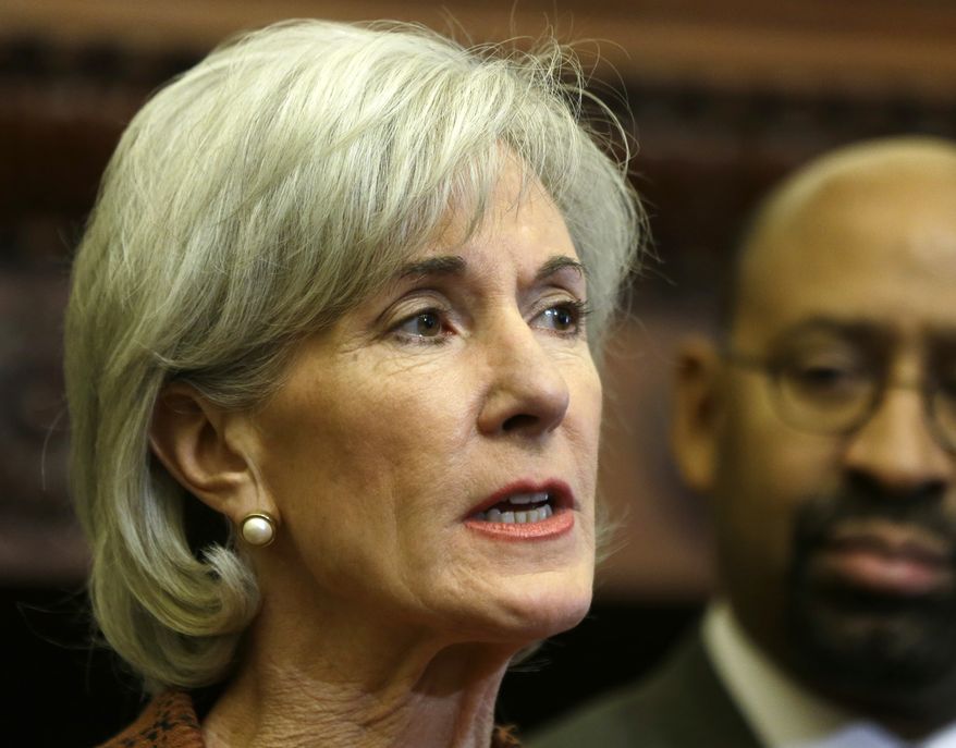 **FILE** Health and Human Services Secretary Kathleen Sebelius, accompanied by Philadelphia Mayor Michael Nutter, speaks Feb. 20, 2013, about the federal health care overhaul during a news conference at City Hall in Philadelphia. (Associated Press)