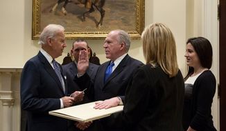 Vice President Joe Biden swears in CIA Director John Brennan in the Roosevelt Room of the White House, March 8, 2013. (White House)