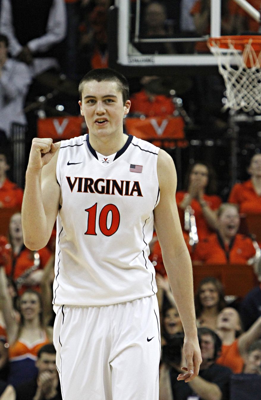 Virginia center Mike Tobey reacts near the end of overtime of an NCAA college basketball game in Charlottesville, Va., Sunday, March 10, 2013. Virginia beat Maryland in overtime 61-58. (AP Photo/Norm Shafer)