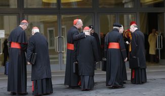 The princes of the Roman Catholic Church, including Cardinals Roger Mahony (left) and Timothy Dolan (third from left) of the United States, arrive for a meeting at the Vatican on Monday, March 11, 2013. The cardinals gathered for their final day of talks before the conclave to elect the next pope amid debate over whether the church needs a manager pope to clean up the Vatican&#39;s messy bureaucracy or a pastoral pope who can inspire the faithful and make Catholicism relevant again. (AP Photo/Alessandra Tarantino)
